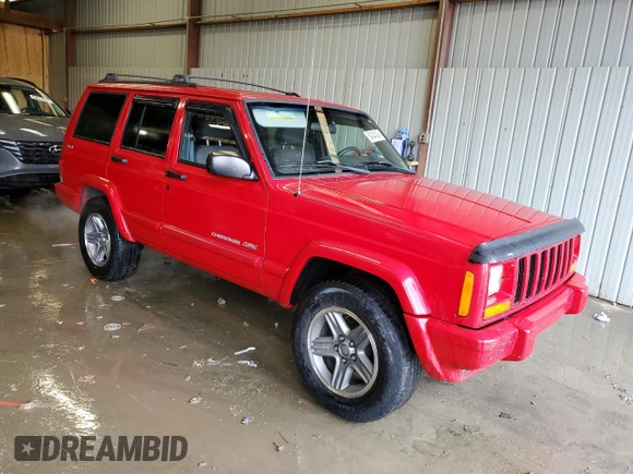 2001 Jeep Cherokee Sport with VIN 1J4FF58S01L519670, listed as a Copart auction lot 84340454 with 132,584 mi miles and Clean title. Bid and sale history available at DreamBid. Image 4.