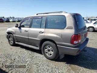 2000 Lexus LX 470 z VIN JT6HT00W9Y0120042, wystawiony jako Copart lot #49644355 z przebiegiem 188 992 mil mil oraz Czysty tytuł • Clean title. Historia ofert i sprzedaży dostępna na DreamBid. Obrazek 2.