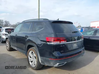 2021 Volkswagen Atlas SE z VIN 1V2HR2CA0MC543876, wystawiony jako IAAI lot #41598298 z przebiegiem 99 171 mil mil oraz . Historia ofert i sprzedaży dostępna na DreamBid. Obrazek 3.