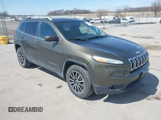2015 Jeep Cherokee North with VIN 1C4PJMCS9FW588826, listed as a IAAI auction lot 41952883 with 145,586 mi miles. Bid and sale history available at carsss.com. Image 1.