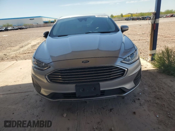 2020 Ford Fusion SE with VIN 3FA6P0HD3LR127008, listed as a Copart auction lot 54830665 with 122,179 mi miles and Salvage title. Bid and sale history available at DreamBid. Image 5.