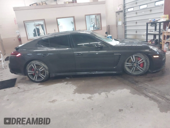 2014 Porsche Panamera GTS with VIN WP0AF2A73EL083133, listed as a IAAI auction lot 41945656 with 75,701 mi miles and . Bid and sale history available at DreamBid. Image 13.