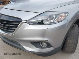 2013 Mazda CX-9 Grand Touring z VIN JM3TB3DV1D0401102, wystawiony jako IAAI lot #41248346 z przebiegiem 122 555 mil mil oraz . Historia ofert i sprzedaży dostępna na DreamBid. Obrazek 6.