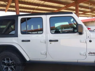 2020 Jeep Wrangler Unlimited Rubicon with VIN 1C4HJXFGXLW107958, listed as a IAAI auction lot 42058477 with 69,951 mi miles and . Bid and sale history available at DreamBid. Image 13.