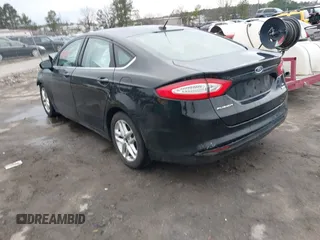 2016 Ford Fusion SE with VIN 3FA6P0HD7GR401848, listed as a IAAI auction lot 41687024 with 124,374 mi miles. Bid and sale history available at carsss.com. Image 3.