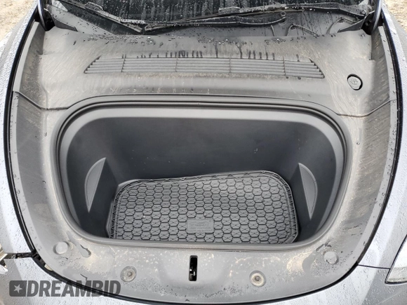 2023 Tesla Model Y Long Range z VIN 7SAYGDEE7PF870370, wystawiony jako Copart lot #55700135 z przebiegiem 32 410 mil mil oraz Szkoda całkowita • Salvage title. Historia ofert i sprzedaży dostępna na DreamBid. Obrazek 11.