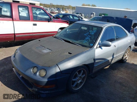2001 Acura Integra z VIN JH4DB76611S001520, wystawiony jako IAAI lot #41390764 z przebiegiem 190 993 mil mil oraz . Historia ofert i sprzedaży dostępna na DreamBid. Obrazek 2.