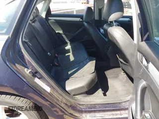 2013 Volkswagen Passat SE with VIN 1VWBP7A37DC065676, listed as a IAAI auction lot 42089057 with 241,371 mi miles. Bid and sale history available at carsss.com. Image 8.