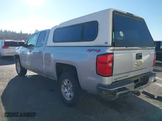 2018 Chevrolet Silverado 1500 LT with VIN 1GCVKREC0JZ157855, listed as a IAAI auction lot 41033669 with 127,315 mi miles. Bid and sale history available at carsss.com. Image 3.