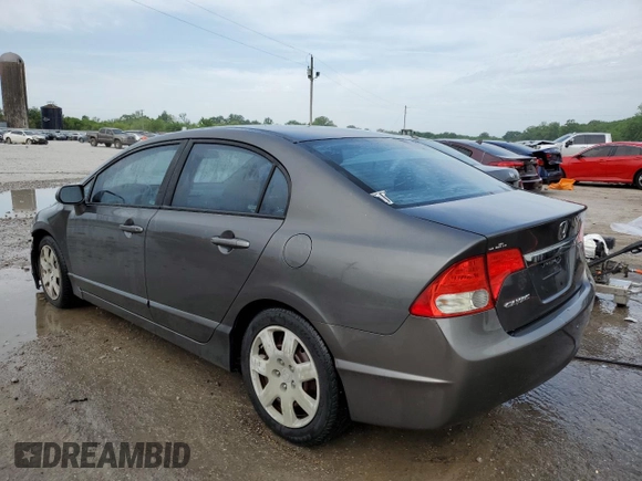 2011 Honda Civic LX with VIN 2HGFA1F55BH522350, listed as a Copart auction lot 53854795 with 39,749 mi miles and Salvage Title. Bid and sale history available at DreamBid. Image 2.