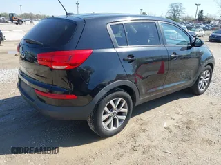 2016 Kia Sportage LX with VIN KNDPBCAC7G7879484, listed as a IAAI auction lot 42116063 with 101,699 mi miles and . Bid and sale history available at carsss.com. Image 4.