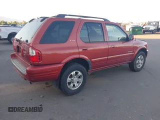 2001 Isuzu Rodeo S z VIN 4S2CK58W414308980, wystawiony jako IAAI lot #42496432 z przebiegiem 166 360 mil mil oraz . Historia ofert i sprzedaży dostępna na DreamBid. Obrazek 4.