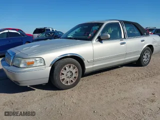 2006 Mercury Grand Marquis GS with VIN 2MEFM74VX6X608873, listed as a IAAI auction lot 40897128 with 163,189 mi miles. Bid and sale history available at carsss.com. Image 2.