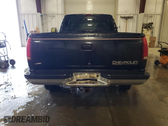 1997 Chevrolet Silverado 1500 with VIN 2GCEK19R4V1278872, listed as a Copart auction lot 51517895 with 250,814 mi miles and Salvage Title. Bid and sale history available at DreamBid. Image 6.