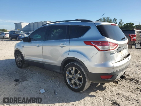 2013 Ford Escape SEL with VIN 1FMCU9H95DUA01616, listed as a Copart auction lot 42802765 with 257,952 mi miles and Salvage Title. Bid and sale history available at DreamBid. Image 2.