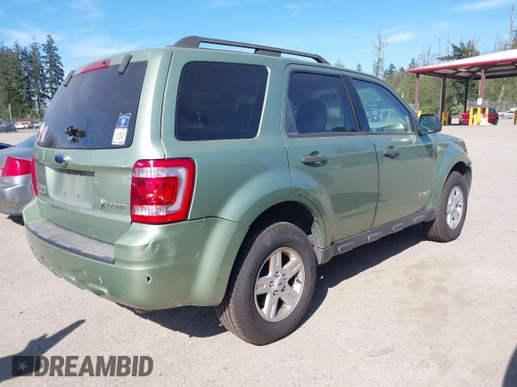 2008 Ford Escape Hybrid z VIN 1FMCU59H48KA68336, wystawiony jako IAAI lot #42083411 z przebiegiem 311 958 mil mil oraz . Historia ofert i sprzedaży dostępna na DreamBid. Obrazek 4.