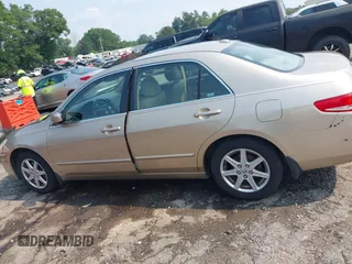 2004 Honda Accord EX with VIN 1HGCM66504A090503, listed as a IAAI auction lot 42351643 with 143,827 mi miles and . Bid and sale history available at DreamBid. Image 14.