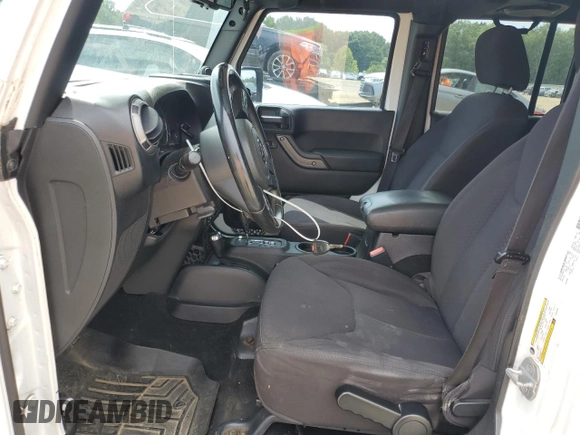 2013 Jeep Wrangler Unlimited Freedom z VIN 1C4BJWDG9DL542248, wystawiony jako Copart lot #58931345 z przebiegiem 215 667 mil mil oraz Czysty tytuł • Clean title. Historia ofert i sprzedaży dostępna na DreamBid. Obrazek 7.
