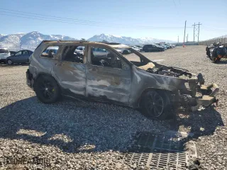2015 Jeep Grand Cherokee Summit with VIN 1C4RJFJM1FC779490, listed as a Copart auction lot 47217545 with 0 mi miles and Salvage Title. Bid and sale history available at carsss.com. Image 4.