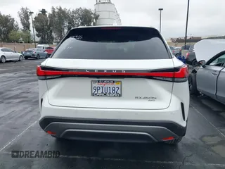 2024 Lexus RX 450h+ Luxury with VIN JTJCJMGA1R2021146, listed as a IAAI auction lot 42204669 with 1,947 mi miles and . Bid and sale history available at DreamBid. Image 17.