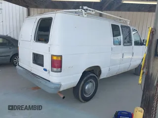 1993 Ford Econoline Cargo with VIN 1FTJE34H2PHA67802, listed as a IAAI auction lot 41909401 with Not Provided miles and . Bid and sale history available at DreamBid. Image 4.