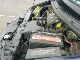 1999 Dodge Caravan SE z VIN 1B4GP44G9XB831601, wystawiony jako IAAI lot #43088597 z przebiegiem 99 819 mil mil oraz . Historia ofert i sprzedaży dostępna na DreamBid. Obrazek 13.