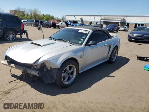 1999 Ford Mustang with VIN 1FAFP4448XF233101, listed as a Copart auction lot 54701005 with 54,585 mi miles and Salvage title. Bid and sale history available at DreamBid. Image 1.