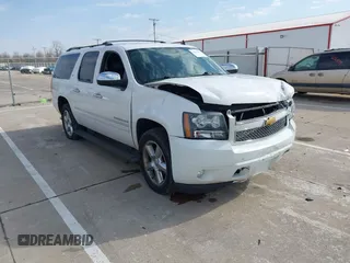 2013 Chevrolet Suburban LTZ with VIN 1GNSKKE74DR246224, listed as a IAAI auction lot 42055607 with 219,504 mi miles and . Bid and sale history available at DreamBid. Image 1.