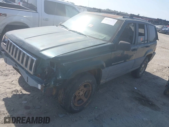 1996 Jeep Grand Cherokee Laredo with VIN 1J4FX58S9TC300710, listed as a IAAI auction lot 42073391 with 1 mi miles. Bid and sale history available at carsss.com. Image 17.