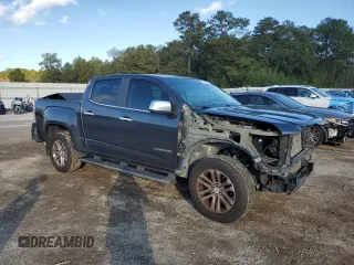 2016 GMC Canyon 2WD SLT with VIN 1GTG5DE37G1271880, listed as a Copart auction lot 79825324 with 141,748 mi miles and Salvage Title. Bid and sale history available at carsss.com. Image 4.