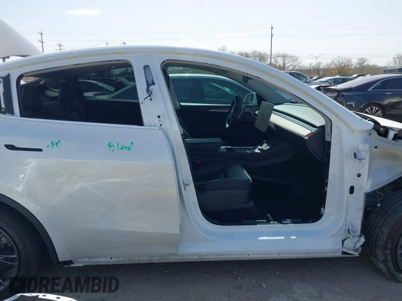 2024 Tesla Model Y with VIN 7SAYGDEDXRA300743, listed as a IAAI auction lot 41690374 with 12,446 mi miles and . Bid and sale history available at DreamBid. Image 14.