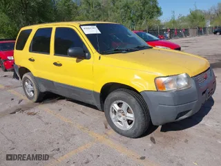 2003 Ford Escape XLS Popular with VIN 1FMYU92113KD90189, listed as a IAAI auction lot 42082279 with 261,215 mi miles. Bid and sale history available at carsss.com. Image 1.