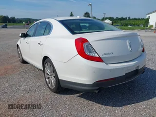 2013 Lincoln MKS EcoBoost with VIN 1LNHL9FT4DG614140, listed as a IAAI auction lot 42866991 with 126,487 mi miles and . Bid and sale history available at DreamBid. Image 3.