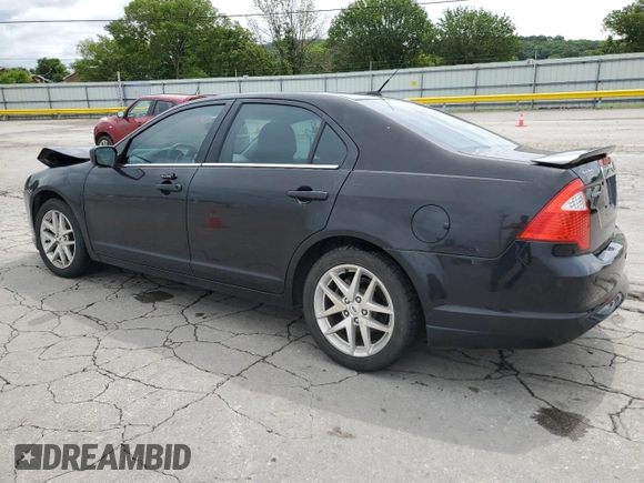 2012 Ford Fusion SEL with VIN 3FAHP0JA0CR386841, listed as a Copart auction lot 61587325 with 129,572 mi miles and Salvage title. Bid and sale history available at DreamBid. Image 2.