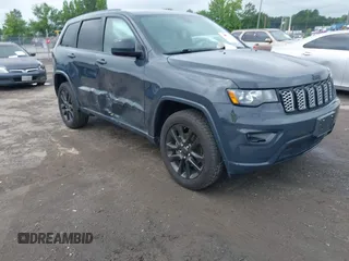 2018 Jeep Grand Cherokee Altitude with VIN 1C4RJFAG2JC180780, listed as a IAAI auction lot 42515009 with 105,339 mi miles and . Bid and sale history available at DreamBid. Image 1.