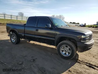 2000 Chevrolet Silverado 1500 LS with VIN 2GCEK19T3Y1230277, listed as a Copart auction lot 51066515 with 131,797 mi miles and Clean Title. Bid and sale history available at carsss.com. Image 4.