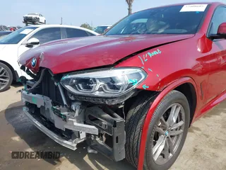 2021 BMW X4 xDrive30i with VIN 5UX2V1C09M9F29509, listed as a IAAI auction lot 42408605 with 46,992 mi miles and . Bid and sale history available at DreamBid. Image 6.