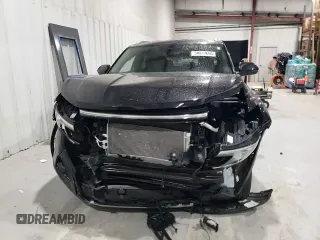 2024 Volkswagen Atlas SE with VIN 1V2WE2CA3RC221565, listed as a Copart auction lot 50817605 with 8,884 mi miles and Salvage title. Bid and sale history available at DreamBid. Image 12.