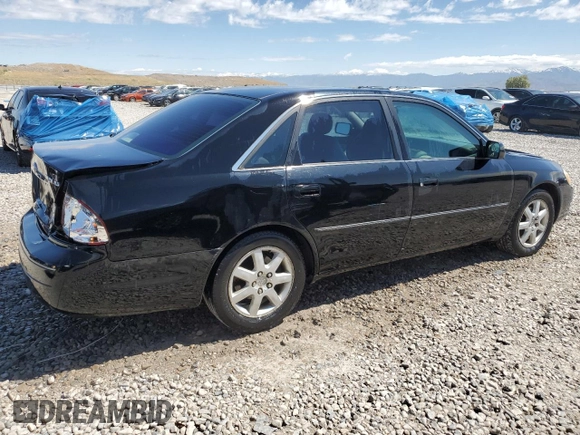 2000 Toyota Avalon XL with VIN 4T1BF28B1YU051192, listed as a Copart auction lot 57316755 with 275,671 mi miles and Salvage title. Bid and sale history available at DreamBid. Image 3.