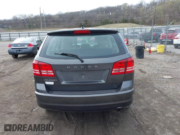 2014 Dodge Journey American Value with VIN 3C4PDCAB7ET151254, listed as a IAAI auction lot 41962026 with 161,115 mi miles and . Bid and sale history available at DreamBid. Image 16.