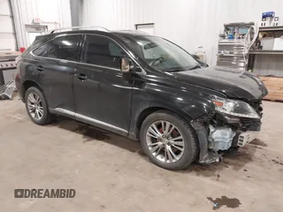 2013 Lexus RX 450h with VIN JTJBC1BA1D2451313, listed as a IAAI auction lot 41245894 with 69,007 mi miles and . Bid and sale history available at DreamBid. Image 1.