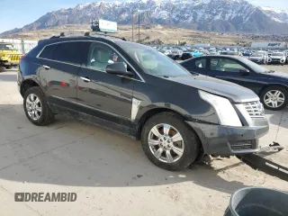 2015 Cadillac SRX Luxury Collection with VIN 3GYFNEE34FS619157, listed as a Copart auction lot 48331665 with 130,477 mi miles and Salvage Title. Bid and sale history available at DreamBid. Image 4.