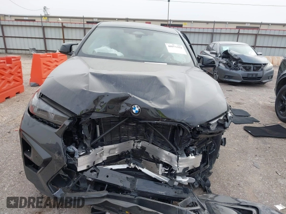 2024 BMW X6 M with VIN 5YM23ET07R9V10225, listed as a IAAI auction lot 40971354 with 1 mi miles. Bid and sale history available at carsss.com. Image 11.