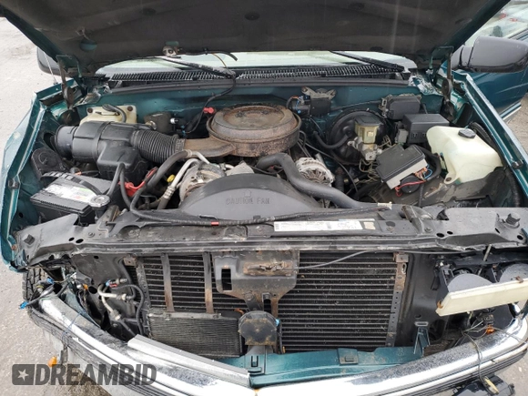 1995 GMC Suburban z VIN 1GKFK16K0SJ748087, wystawiony jako Copart lot #85121834 z przebiegiem 191 550 mil mil oraz Szkoda całkowita • Salvage title. Historia ofert i sprzedaży dostępna na DreamBid. Obrazek 13.