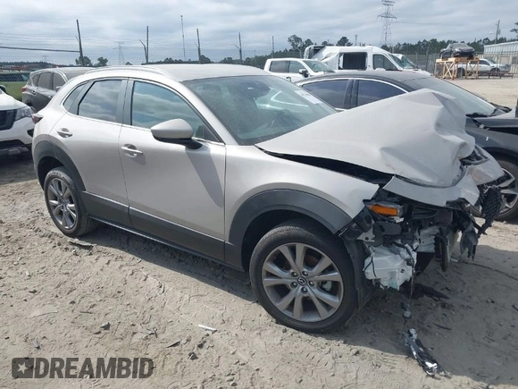 2023 Mazda CX-30 S Select with VIN 3MVDMBBM6PM518380, listed as a IAAI auction lot 40720006 with 13,422 mi miles and . Bid and sale history available at DreamBid. Image 1.