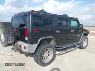 2006 Hummer H2 with VIN 5GRGN23U66H120601, listed as a IAAI auction lot 41524634 with 155,003 mi miles. Bid and sale history available at carsss.com. Image 4.