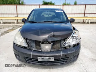 2010 Nissan Versa S with VIN 3N1BC1CP1AL460502, listed as a Copart auction lot 61106935 with 217,945 mi miles and Salvage title. Bid and sale history available at DreamBid. Image 5.