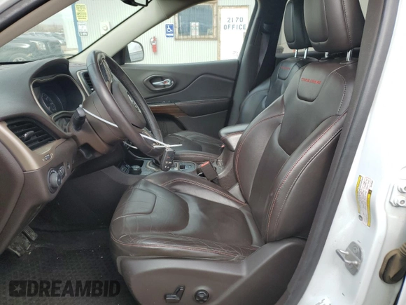 2014 Jeep Cherokee Trailhawk with VIN 1C4PJMBS7EW183855, listed as a Copart auction lot 46143085 with 146,901 mi miles and Salvage Title. Bid and sale history available at DreamBid. Image 7.