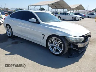 2015 BMW 4 Series 428i with VIN WBA4A9C50FGL85857, listed as a IAAI auction lot 42542619 with 136,411 mi miles and . Bid and sale history available at DreamBid. Image 1.