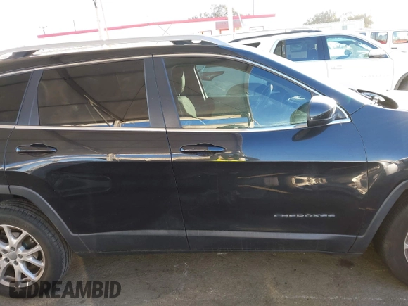 2015 Jeep Cherokee Latitude with VIN 1C4PJLCB7FW632624, listed as a IAAI auction lot 41413648 with 110,274 mi miles. Bid and sale history available at carsss.com. Image 12.